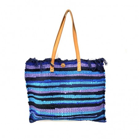 Borsa blu in dari indiano e manici in pelle.