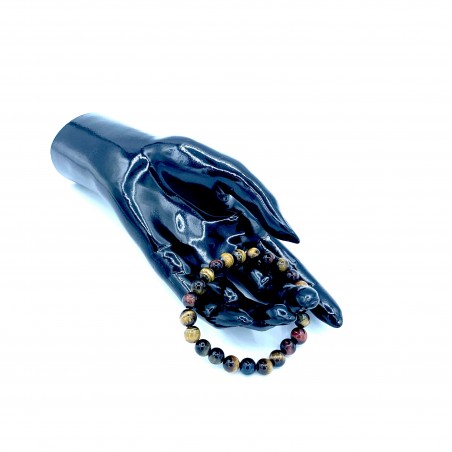 Bracciale in pietra con occhio di tigre per protezione.