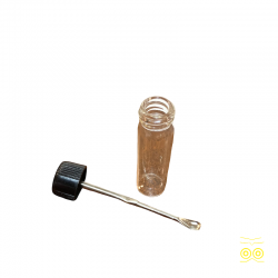 Flacon vide avec une cuillère pour parfum ou poudre.