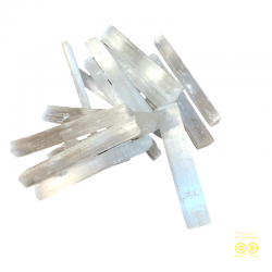 Selenite stick to recharge the stones and practice yoga and reiki.
