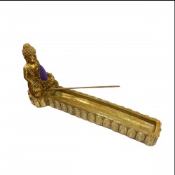 Buddha incense holder in meditation.
