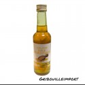Botella de aceite de mostaza para cabello y cuerpo.