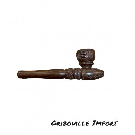Handmade wooden pipe carved in India.