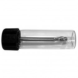 Flacon en verre avec cuillère.