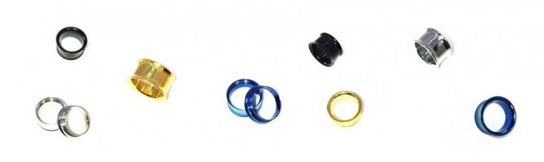 Plugs of different colors in surgical steel.